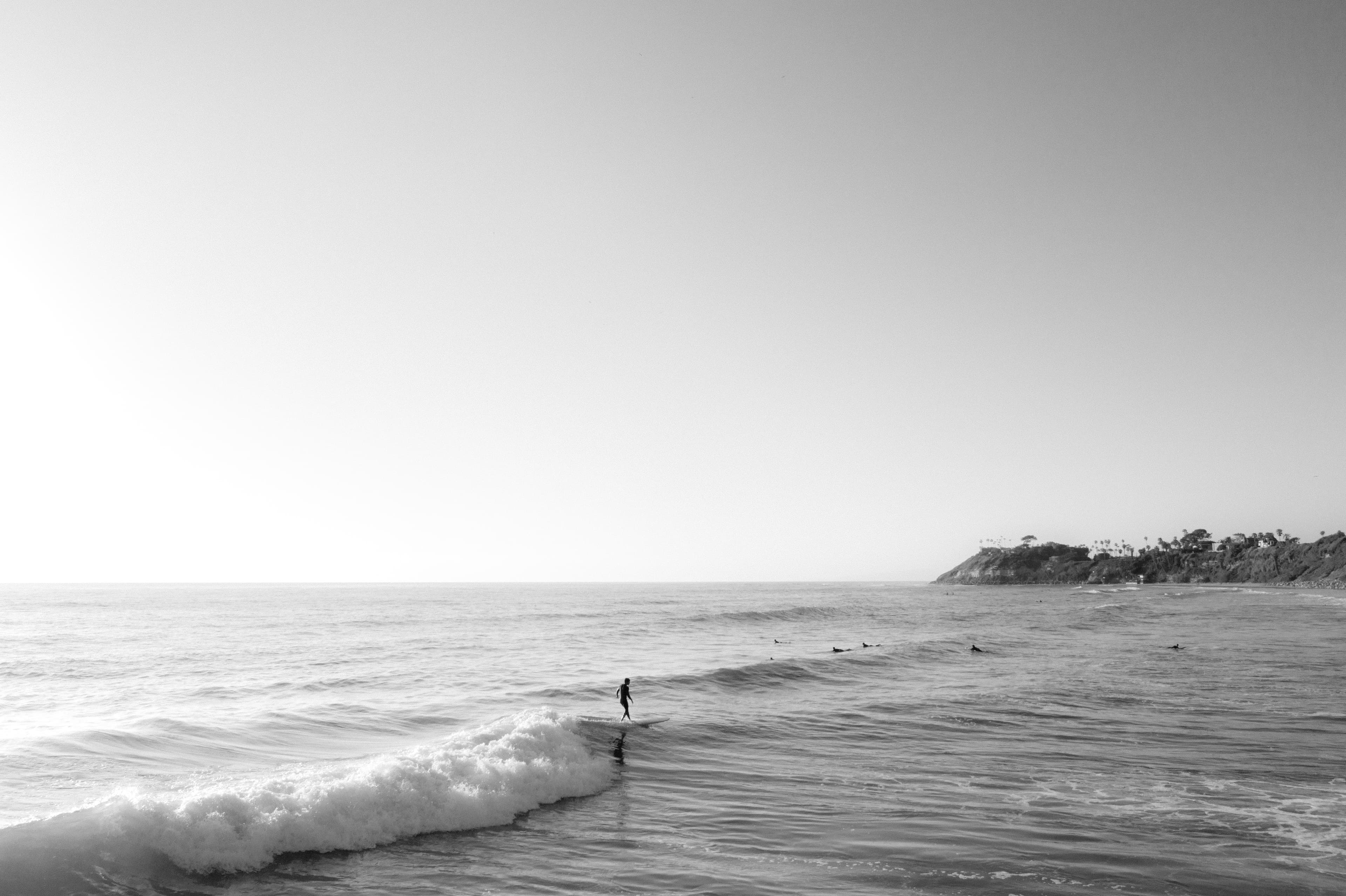 Turquoise tropical water under golden light with palms